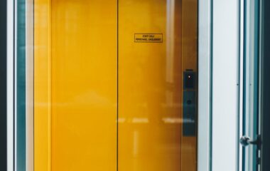 closed yellow elevator door