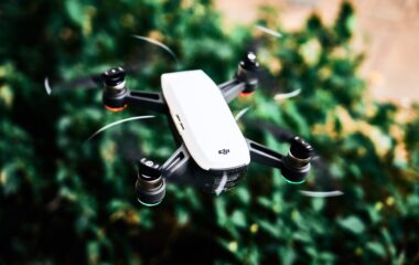 white and black dji quadcopter