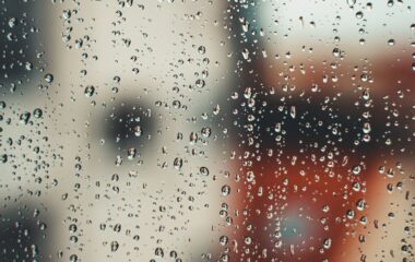 abstract background with raindrops on misted glass