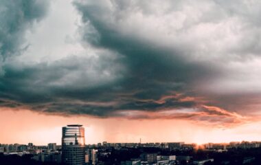 dense clouds over building in city