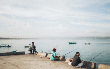 three men fishing