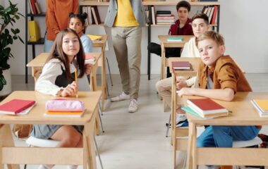 teacher with his students in the classroom