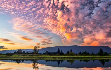 symmetrical photography of clouds covered blue sky